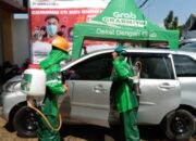 Bahu Membahu dengan ACT, Armada Grab Disemprot Disinfektan