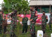 Personil Koramil Taraju Semprotkan BIOS 44 di Lahan Kurang Produktif