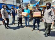 Polisi Bagikan Paket Sembako dan Beras Bagi Terdampak PPKM Darurat